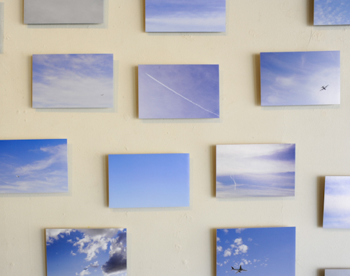 Close-up of Stephen Clamers' 'Limbo' photographs at the Air Travel Exhibition at Corridor 2122